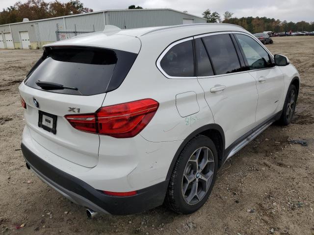 Photo 4 from auction – 2016 BMW X1 XDRIVE2 with VIN WBXHT3C33G5E54845