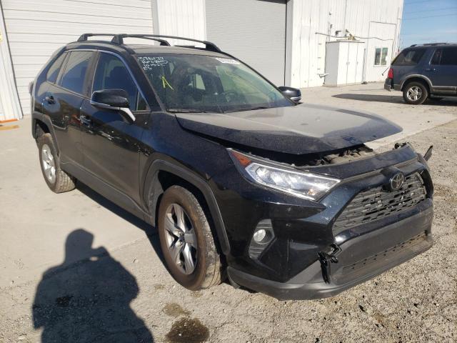 TOYOTA RAV4 XLE 2019 with VIN JTMP1RFV6KD014774 - Photo from auction