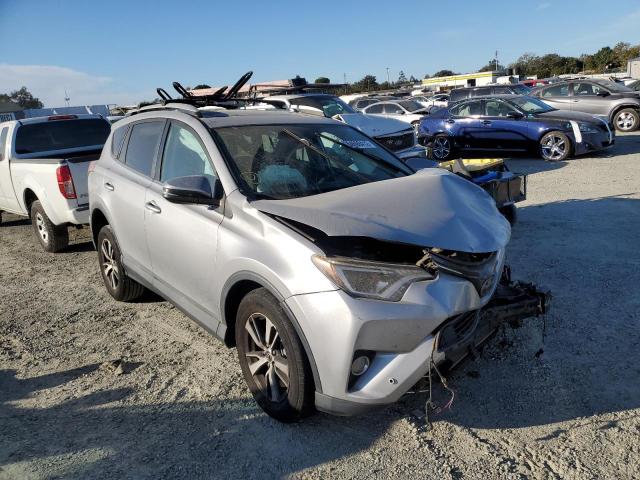TOYOTA RAV4 XLE 2016 with VIN 2T3WFREV4GW241244 - Photo from auction