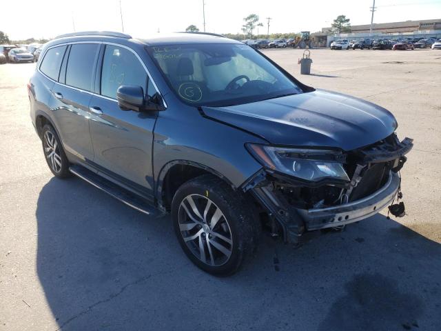 HONDA PILOT TOUR 2016 with VIN 5FNYF5H91GB009030 - Photo from auction