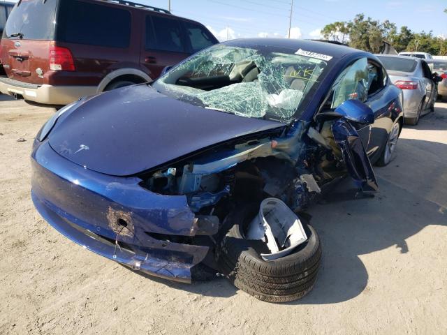 TESLA MODEL 3 2022 with VIN 5YJ3E1EAXNF371598 - Photo from auction