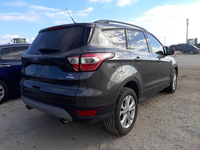 Photo 4 from auction – 2017 FORD ESCAPE SE with VIN 1FMCU0GD2HUC84662