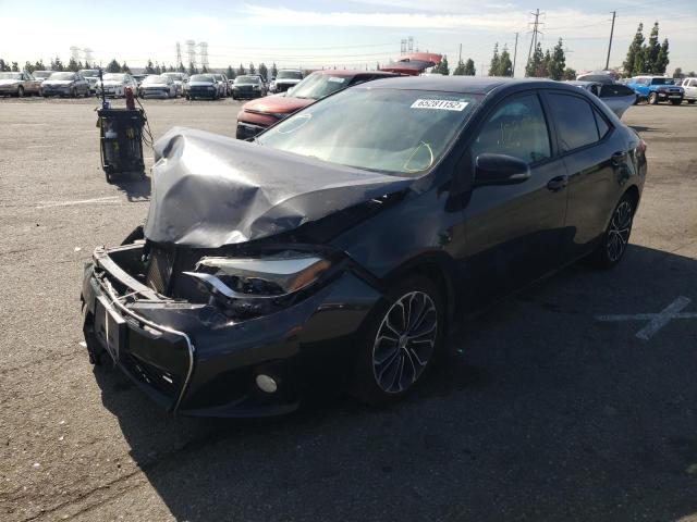 Photo 2 from auction – 2014 TOYOTA COROLLA L with VIN 5YFBURHE2EP104911