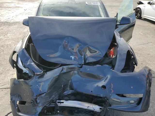 Photo 7 from auction – 2022 TESLA MODEL Y with VIN 7SAYGDEF6NF491401