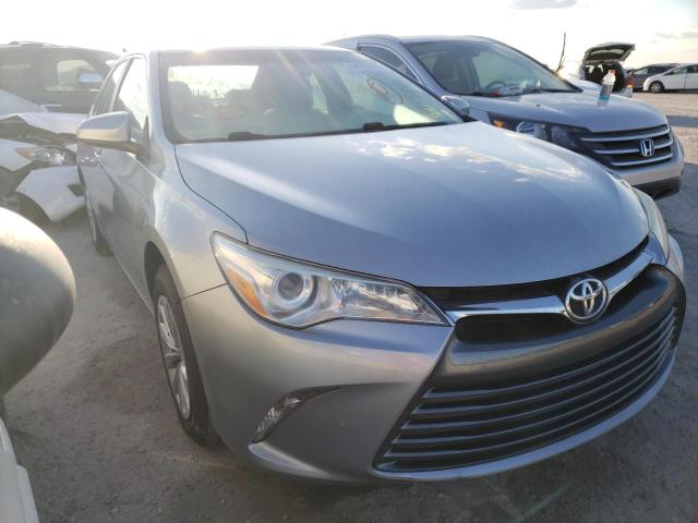 TOYOTA CAMRY LE 2017 with VIN 4T1BF1FKXHU700243 - Photo from auction