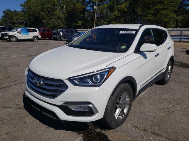 Photo 2 from auction – 2017 HYUNDAI SANTA FE S with VIN 5NMZU3LB1HH019274