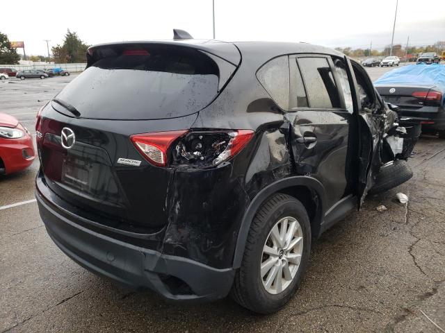 Photo 4 from auction – 2014 MAZDA CX-5 TOURI with VIN JM3KE2CY1E0305593