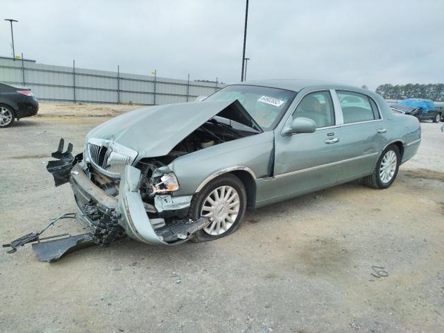 Photo 2 from auction – 2004 LINCOLN TOWN CAR E with VIN 1LNHM81W04Y632623