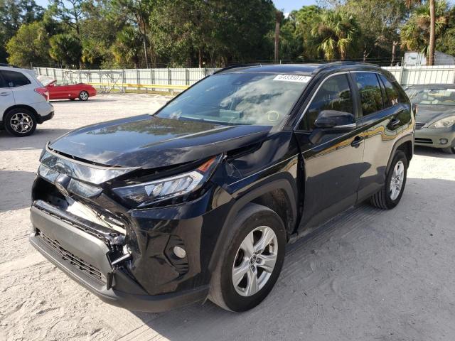 Photo 2 from auction – 2019 TOYOTA RAV4 XLE with VIN JTMW1RFVXKD509975