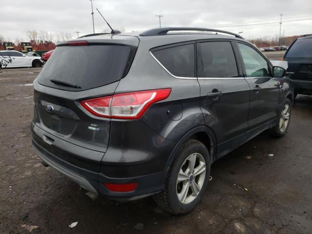 Photo 4 from auction – 2016 FORD ESCAPE SE with VIN 1FMCU9GX8GUC25032