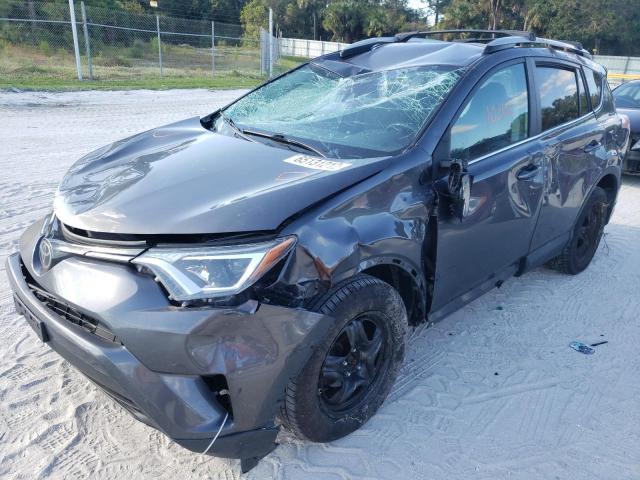 Photo 2 from auction – 2017 TOYOTA RAV4 LE with VIN 2T3BFREV3HW572767