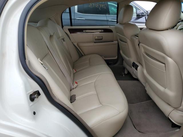 Photo 6 from auction – 2004 LINCOLN TOWN CAR U with VIN 1LNHM83W54Y645283
