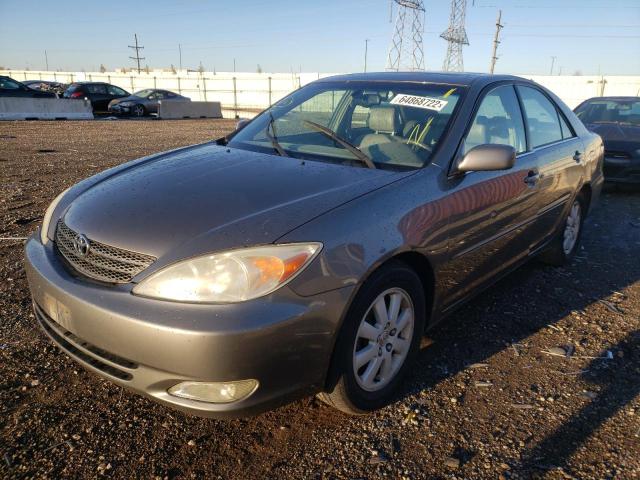 TOYOTA CAMRY LE 2003 with VIN 4T1BE30K63U668813 - Photo from auction