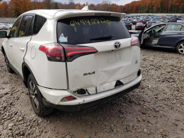 Photo 9 from auction – 2017 TOYOTA RAV4 LE with VIN JTMBFREV5HJ716172