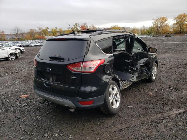 Photo 4 from auction – 2014 FORD ESCAPE SE with VIN 1FMCU9GX9EUA03628