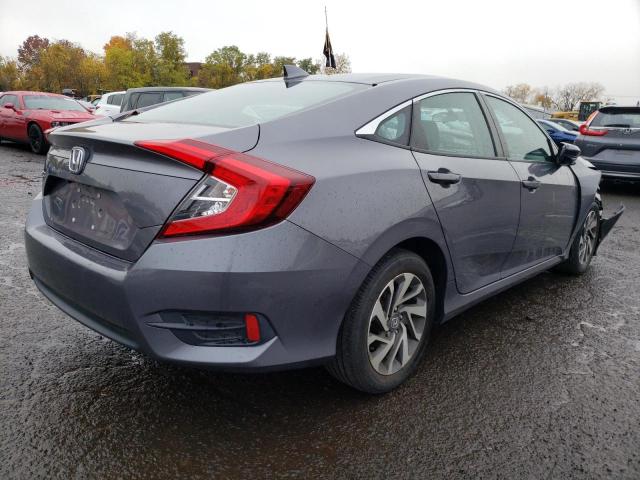 Photo 4 from auction – 2018 HONDA CIVIC EX with VIN 19XFC2F76JE203002