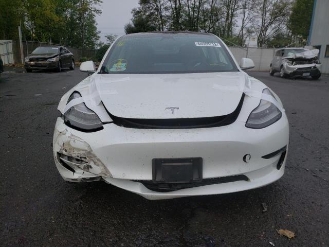 Photo 9 from auction – 2018 TESLA MODEL 3 with VIN 5YJ3E1EB4JF181489