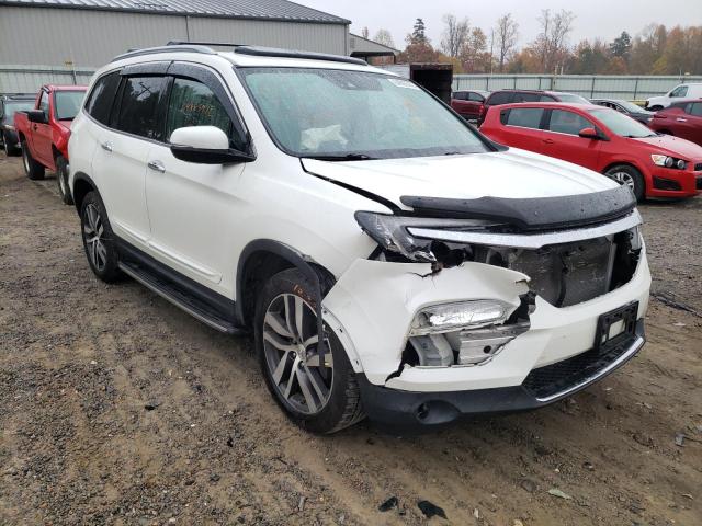 HONDA PILOT ELIT 2017 with VIN 5FNYF6H00HB076033 - Photo from auction