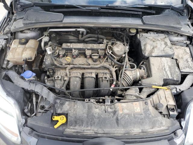 Foto 7 de la subasta – 2014 FORD FOCUS SE con VIN 1FADP3K25EL355156
