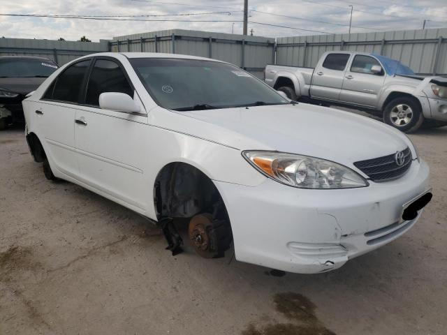 TOYOTA CAMRY LE 2004 with VIN 4T1BE32K74U370608 - Photo from auction