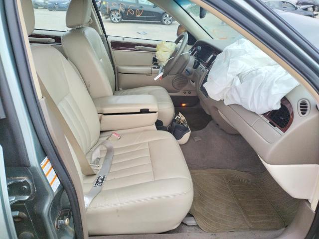 Photo 5 from auction – 2004 LINCOLN TOWN CAR E with VIN 1LNHM81W04Y632623