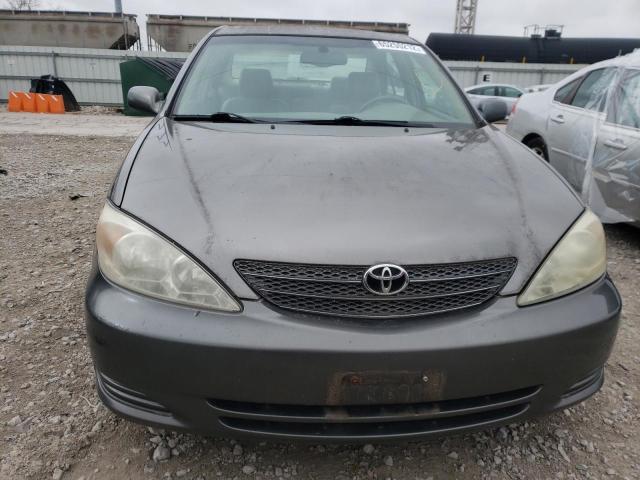 Photo 9 from auction – 2002 TOYOTA CAMRY LE with VIN 4T1BF30K52U509017