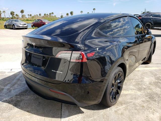 Zdjęcie 4 z aukcji – 2021 TESLA MODEL Y z VIN 5YJYGDEE9MF172920