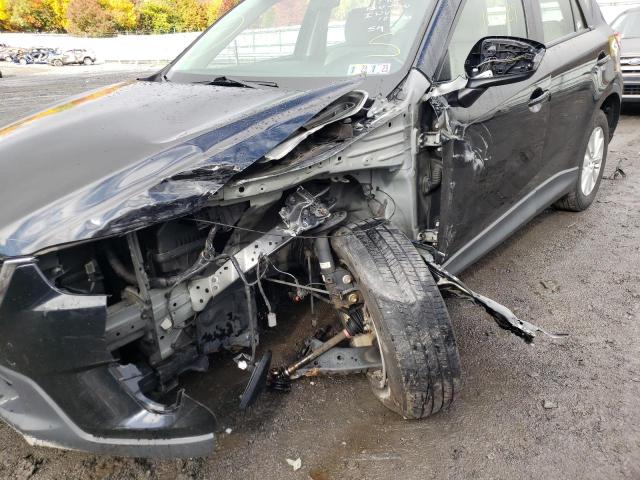 Photo 9 from auction – 2014 MAZDA CX-5 SPORT with VIN JM3KE2BE9E0361014