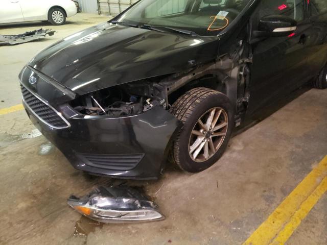 Photo 9 from auction – 2015 FORD FOCUS SE with VIN 1FADP3F28FL374778