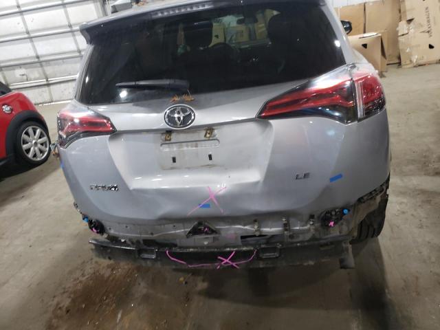Photo 9 from auction – 2018 TOYOTA RAV4 LE with VIN 2T3ZFREV1JW469898