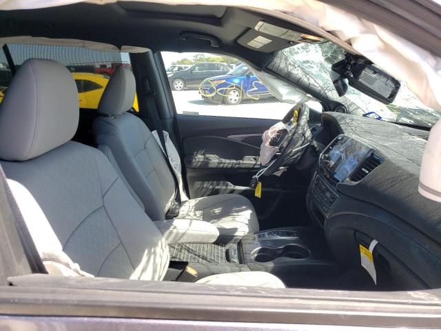 Photo 5 from auction – 2021 HONDA PASSPORT E with VIN 5FNYF8H5XMB039976