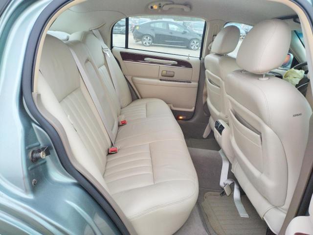 Photo 6 from auction – 2004 LINCOLN TOWN CAR E with VIN 1LNHM81W04Y632623