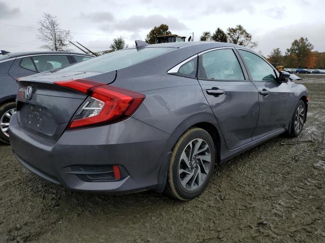 Photo 4 from auction – 2017 HONDA CIVIC EX with VIN 2HGFC2F74HH563059