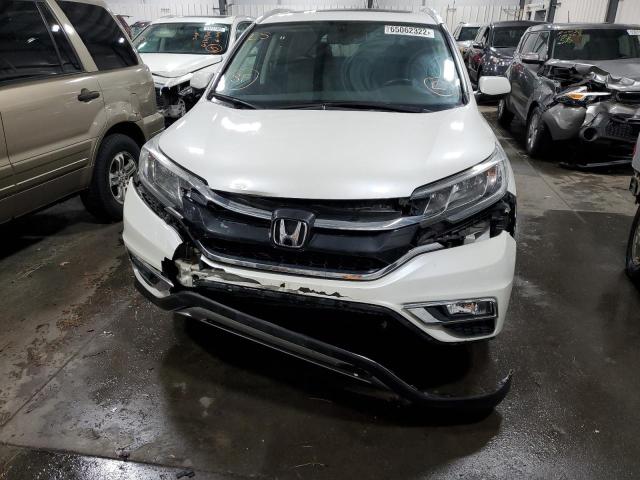 Photo 9 from auction – 2015 HONDA CR-V EXL with VIN 5J6RM4H71FL073173