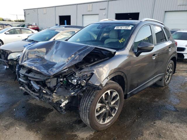 Photo 2 from auction – 2016 MAZDA CX-5 GT with VIN JM3KE2DY7G0789125
