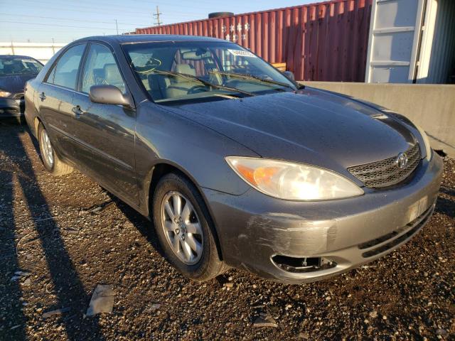 Photo 4 from auction – 2003 TOYOTA CAMRY LE with VIN 4T1BE30K63U668813