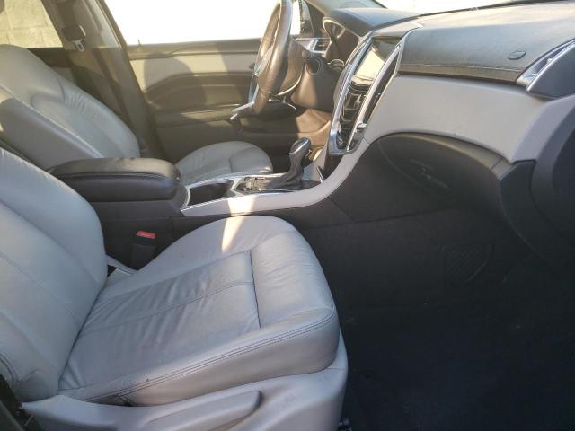 Foto 5 de la subasta – 2014 CADILLAC SRX con VIN 3GYFNAE37ES576859