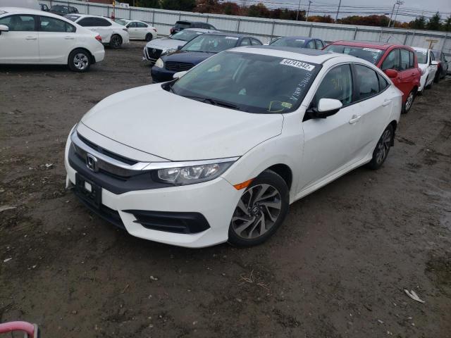 Photo 2 from auction – 2018 HONDA CIVIC EX with VIN 2HGFC2F74JH576612