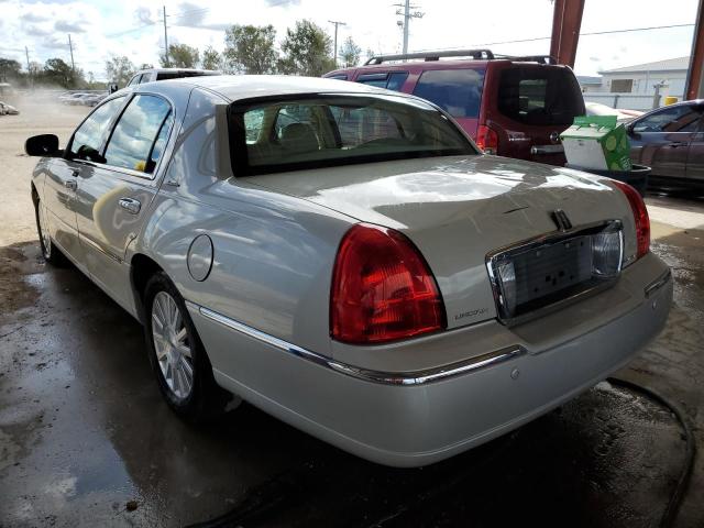 Photo 3 from auction – 2004 LINCOLN TOWN CAR E with VIN 1LNHM81W34Y677684