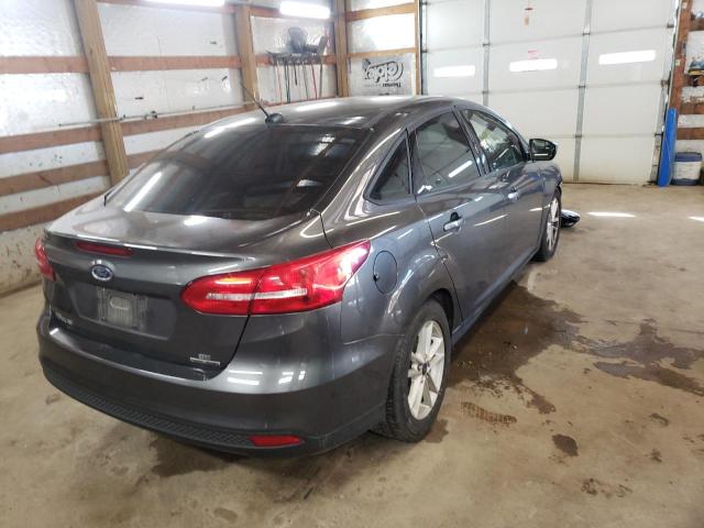 Photo 4 from auction – 2016 FORD FOCUS SE with VIN 1FADP3F28GL266758