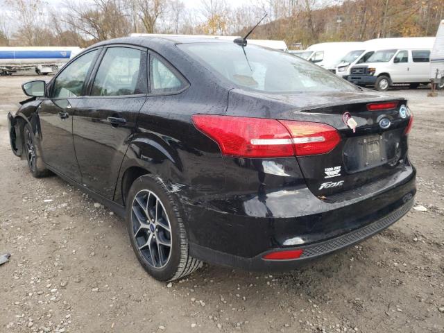 Photo 3 from auction – 2018 FORD FOCUS SE with VIN 1FADP3F22JL215649