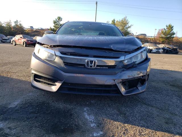 Photo 9 from auction – 2016 HONDA CIVIC LX with VIN 19XFC2F51GE038614