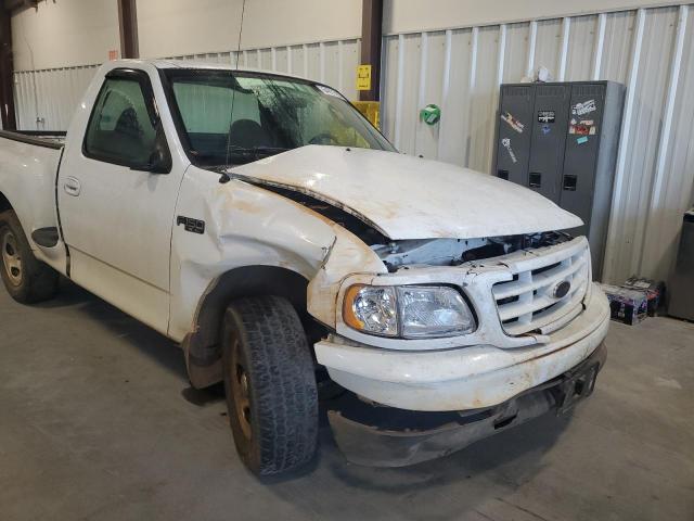 Photo 9 from auction – 2003 FORD F150 with VIN 1FTRF07203KD79829