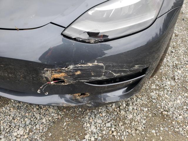 Photo 10 from auction – 2022 TESLA MODEL 3 with VIN 5YJ3E1EB1NF334870