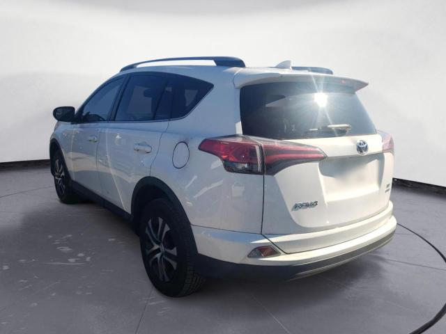 Photo 3 from auction – 2017 TOYOTA RAV4 LE with VIN JTMBFREV4HJ120826