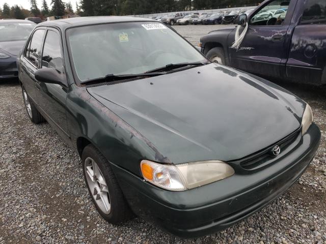 TOYOTA COROLLA VE 2000 with VIN 1NXBR12E7YZ353980 - Photo from auction