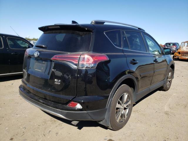 Photo 4 from auction – 2017 TOYOTA RAV4 XLE with VIN 2T3RFREV7HW670327