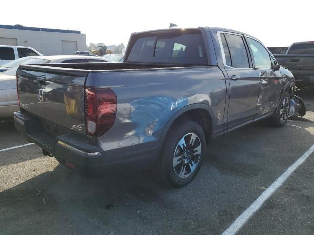 Photo 4 from auction – 2020 HONDA RIDGELINE with VIN 5FPYK3F58LB023458