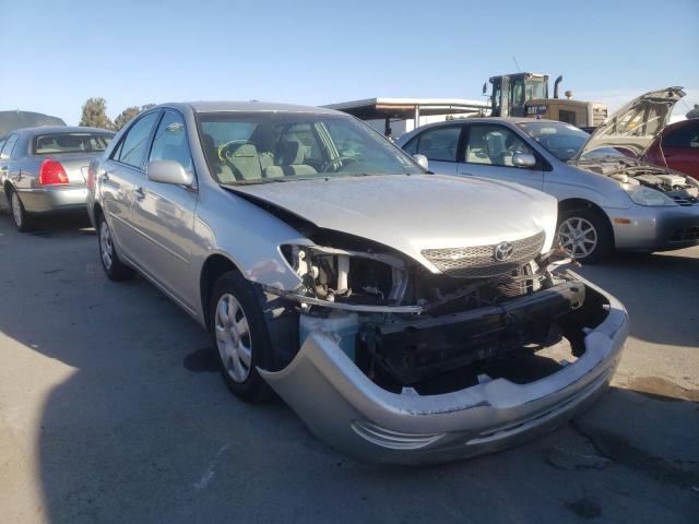 TOYOTA CAMRY LE 2003 with VIN 4T1BE30K93U702856 - Photo from auction