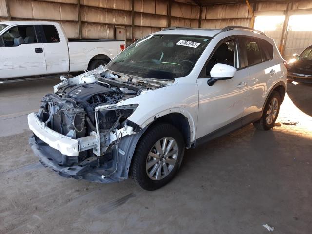 Photo 2 from auction – 2014 MAZDA CX-5 TOURI with VIN JM3KE4CY5E0389543